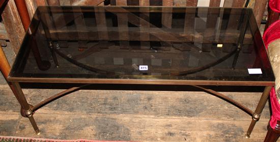 Brass coffee table with a glass top